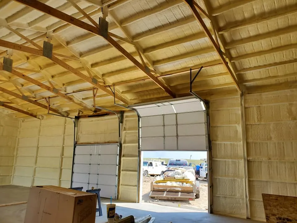 Pole barn with closed-cell spray foam on the roof deck and walls